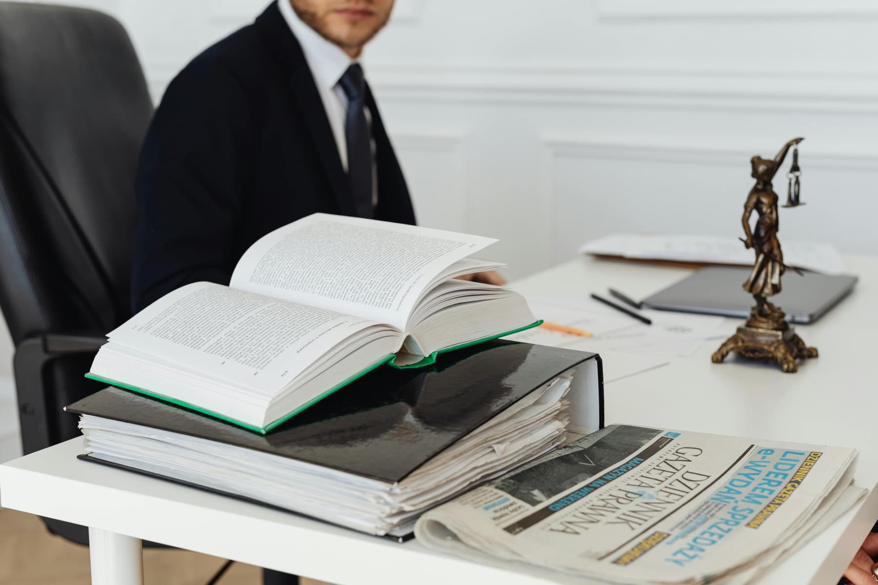 Law books and documents on a professional desk.